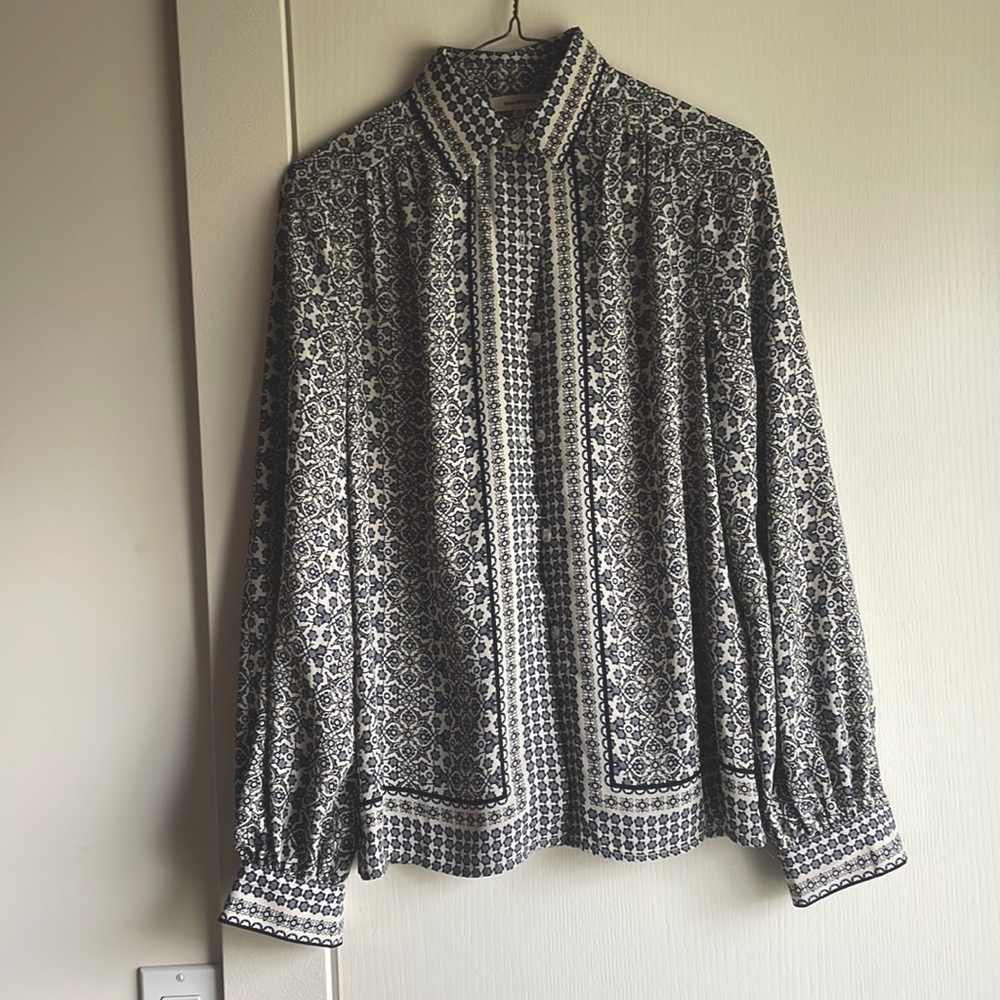 Women’s blue and white floral button up